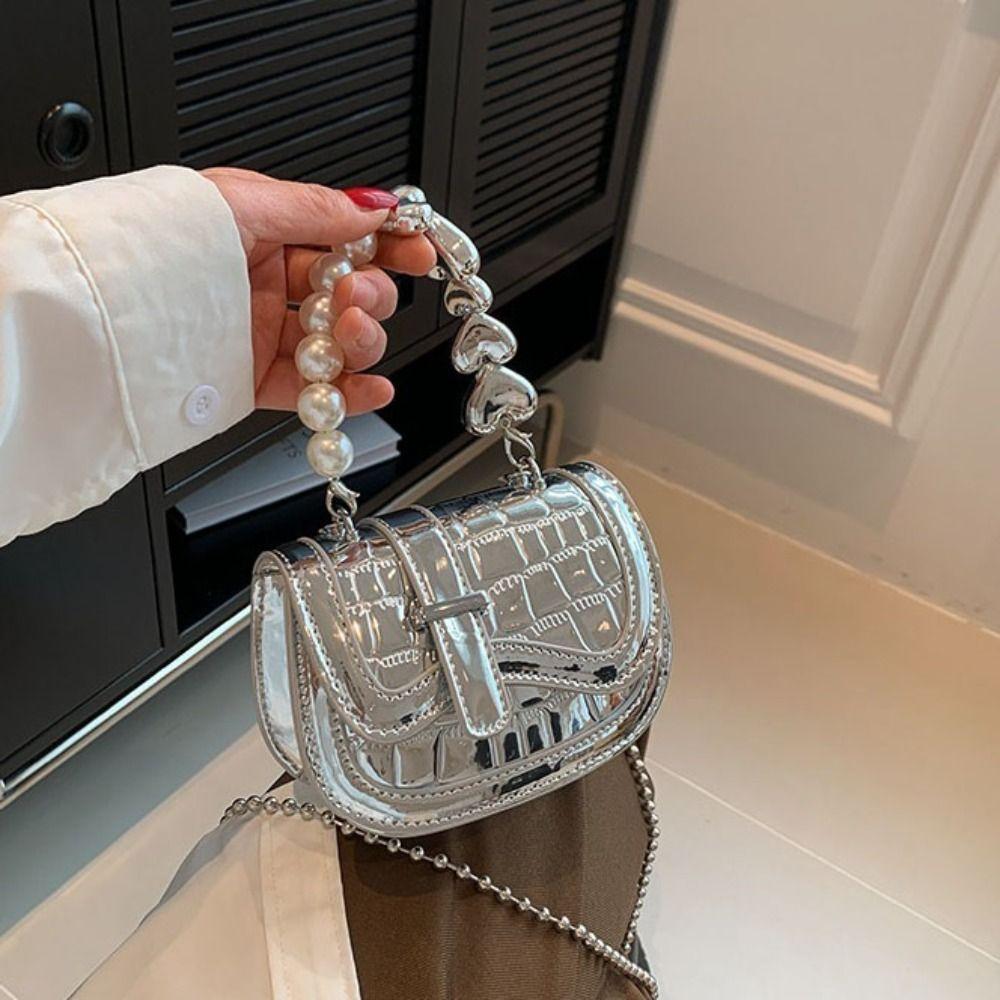 Серебряная яркая сумка через плечо из искусственной кожи с крокодиловым узором, мини-сумка на плечо, модная косметичка
Серебряная яркая сумка через плечо из искусственной кожи с крокодиловым узором, мини-сумка на плечо, модная косметичка