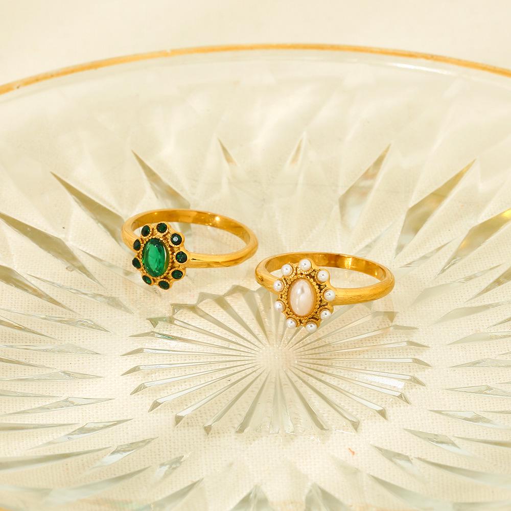 French INS-Style Retro Zircon-Inlaid 18K Gold-Plated Stainless Steel Ring with Emerald and Pearl Accents Size 7
French INS-Style Retro Zircon-Inlaid 18K Gold-Plated Stainless Steel Ring with Emerald and Pearl Accents Size 7