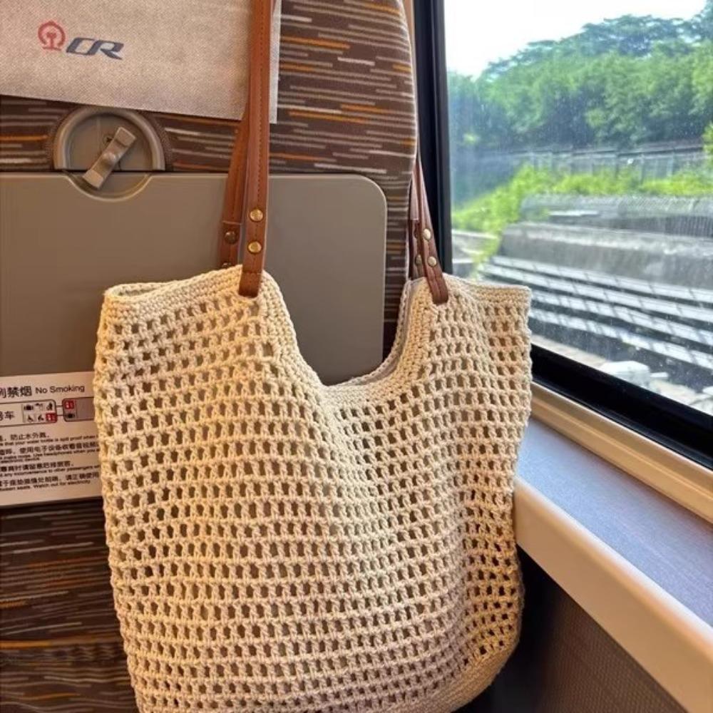 Summer straw bag woven bag 2025 new lazy wind French hollow grid large capacity seaside shoulder beach bag
Summer straw bag woven bag 2025 new lazy wind French hollow grid large capacity seaside shoulder beach bag
