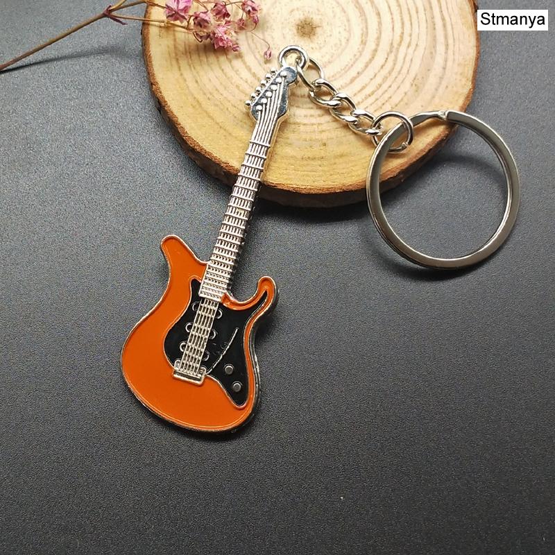 New Dice Key Chain Metal Personality Dice Poker Soccer Guitar Model Alloy Keychain Gift Car Key Ring 17045 помаранчевий
New Dice Key Chain Metal Personality Dice Poker Soccer Guitar Model Alloy Keychain Gift Car Key Ring 17045 помаранчевий
