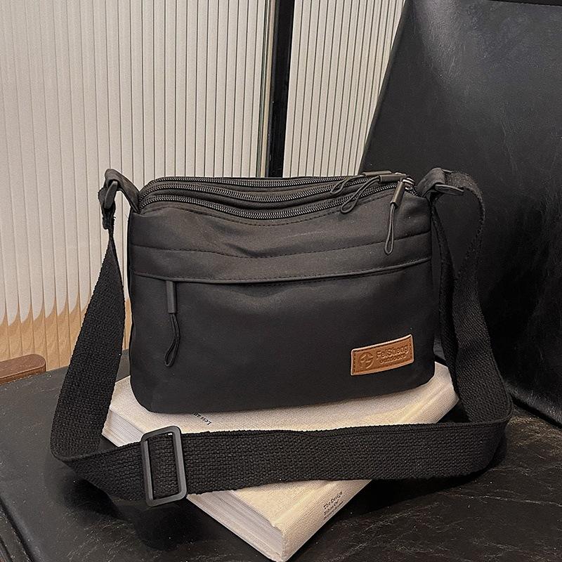 Unisex Fabric Shoulder Bag, Japanese Simple Style, Korean Casual Crossbody with Multiple Compartments, Large Capacity чёрный
Unisex Fabric Shoulder Bag, Japanese Simple Style, Korean Casual Crossbody with Multiple Compartments, Large Capacity чёрный