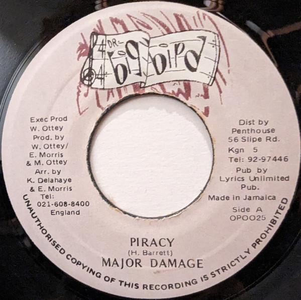 7inch Record MAJOR DAMAGE - Piracy OP0025 Dr. Big Bird 1994 Jamaica Reggae, Ska & Dub Used
7inch Record MAJOR DAMAGE - Piracy OP0025 Dr. Big Bird 1994 Jamaica Reggae, Ska & Dub Used