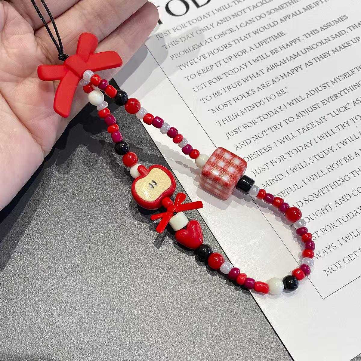 Червоний бант з намистинами для телефону та брелок-підвіска для камери
Червоний бант з намистинами для телефону та брелок-підвіска для камери