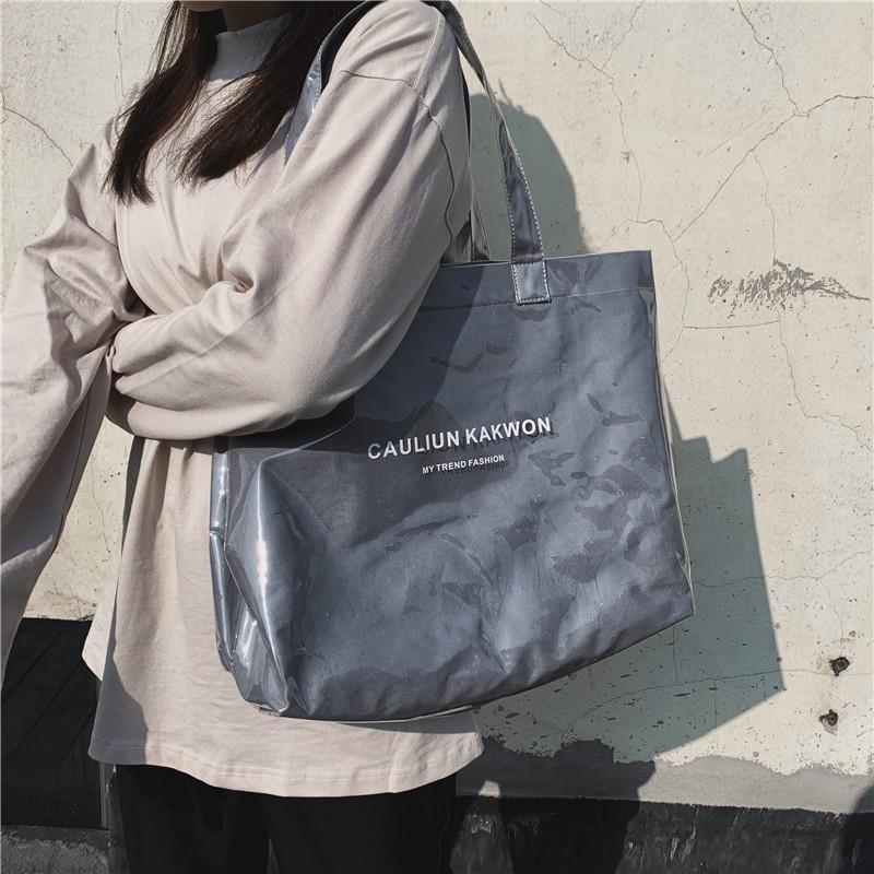 Large-capacity Transparent Jelly Bag Trendy PVC Beach Tote Bag Travel Portable Shoulder Bag Women Handbags Casual Tote
Large-capacity Transparent Jelly Bag Trendy PVC Beach Tote Bag Travel Portable Shoulder Bag Women Handbags Casual Tote