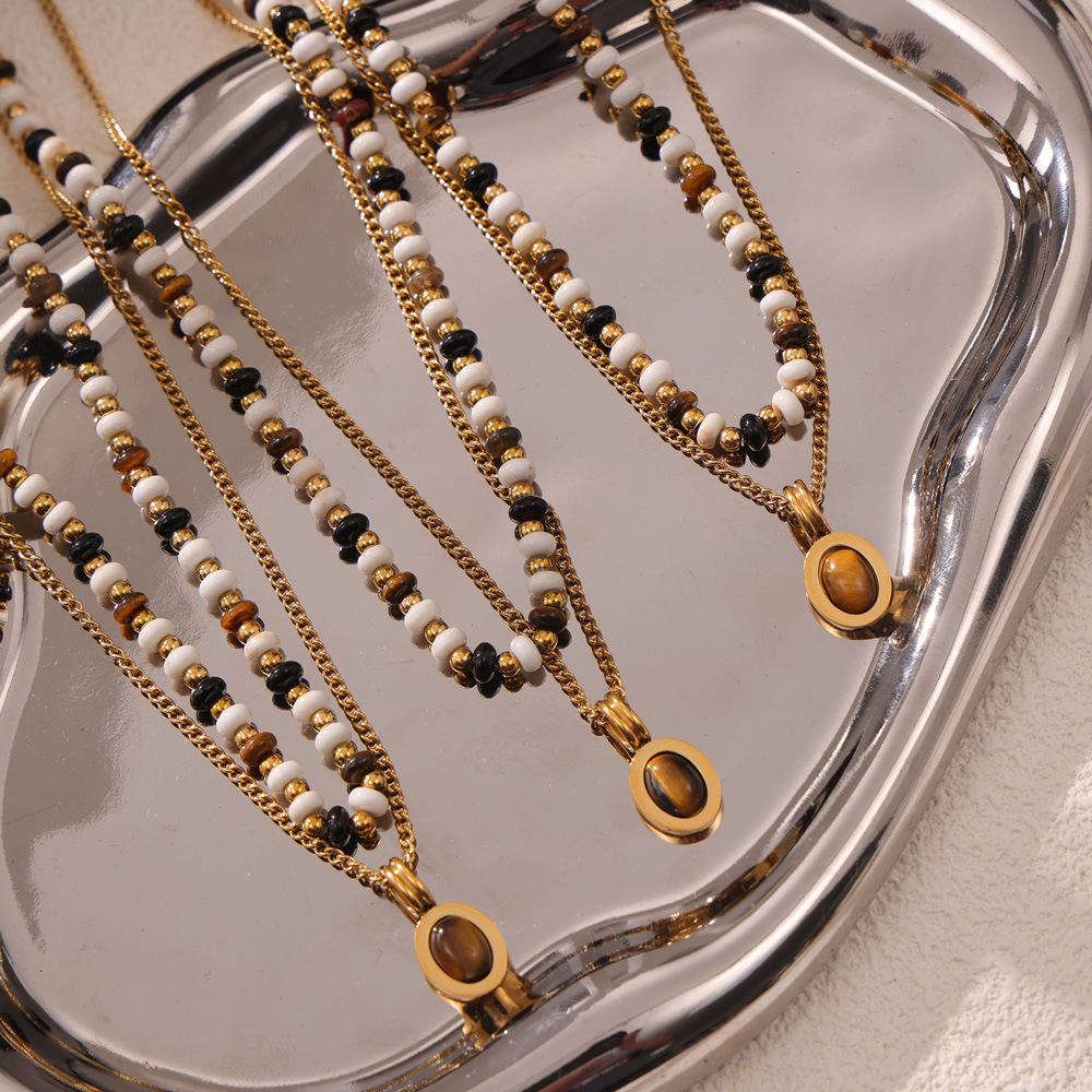 Women s Retro Tiger Eye Pendant Necklace, Double-Layered Light Luxury with Natural Stone Beads on Titanium Steel Clavicle Chain
Women s Retro Tiger Eye Pendant Necklace, Double-Layered Light Luxury with Natural Stone Beads on Titanium Steel Clavicle Chain