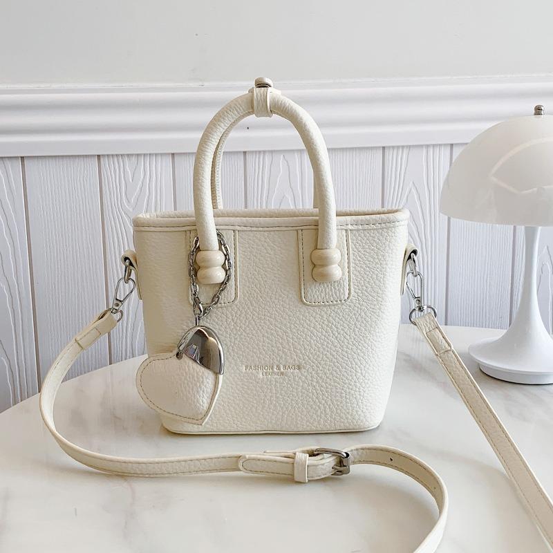 Today s popular small bag women s new fashion versatile shoulder messenger bag textured portable bucket bag off білий колір
Today s popular small bag women s new fashion versatile shoulder messenger bag textured portable bucket bag off білий колір
