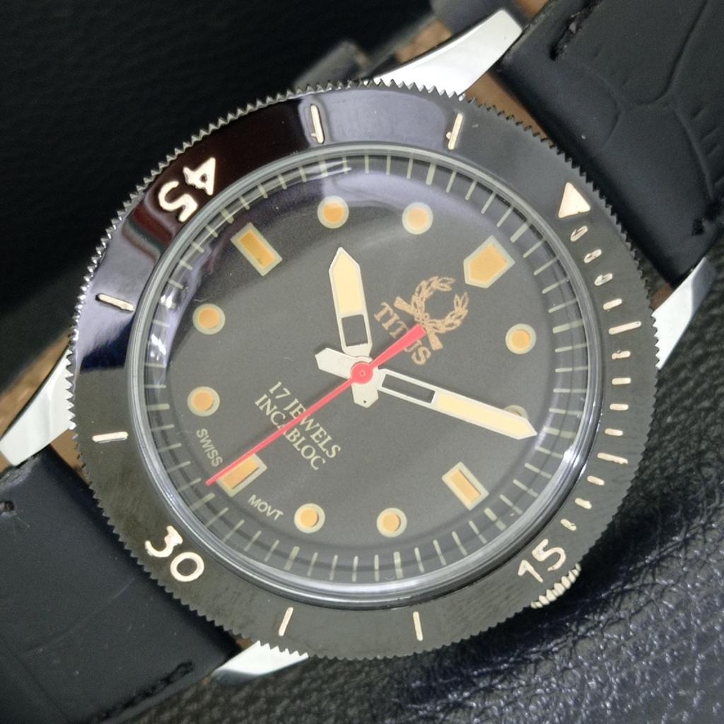 VINTAGE TITUS HAND-WINDING SWISS MENS TURNABLE BEZEL BLACK DIAL WATCH a700235-5 R202-a700235
VINTAGE TITUS HAND-WINDING SWISS MENS TURNABLE BEZEL BLACK DIAL WATCH a700235-5 R202-a700235