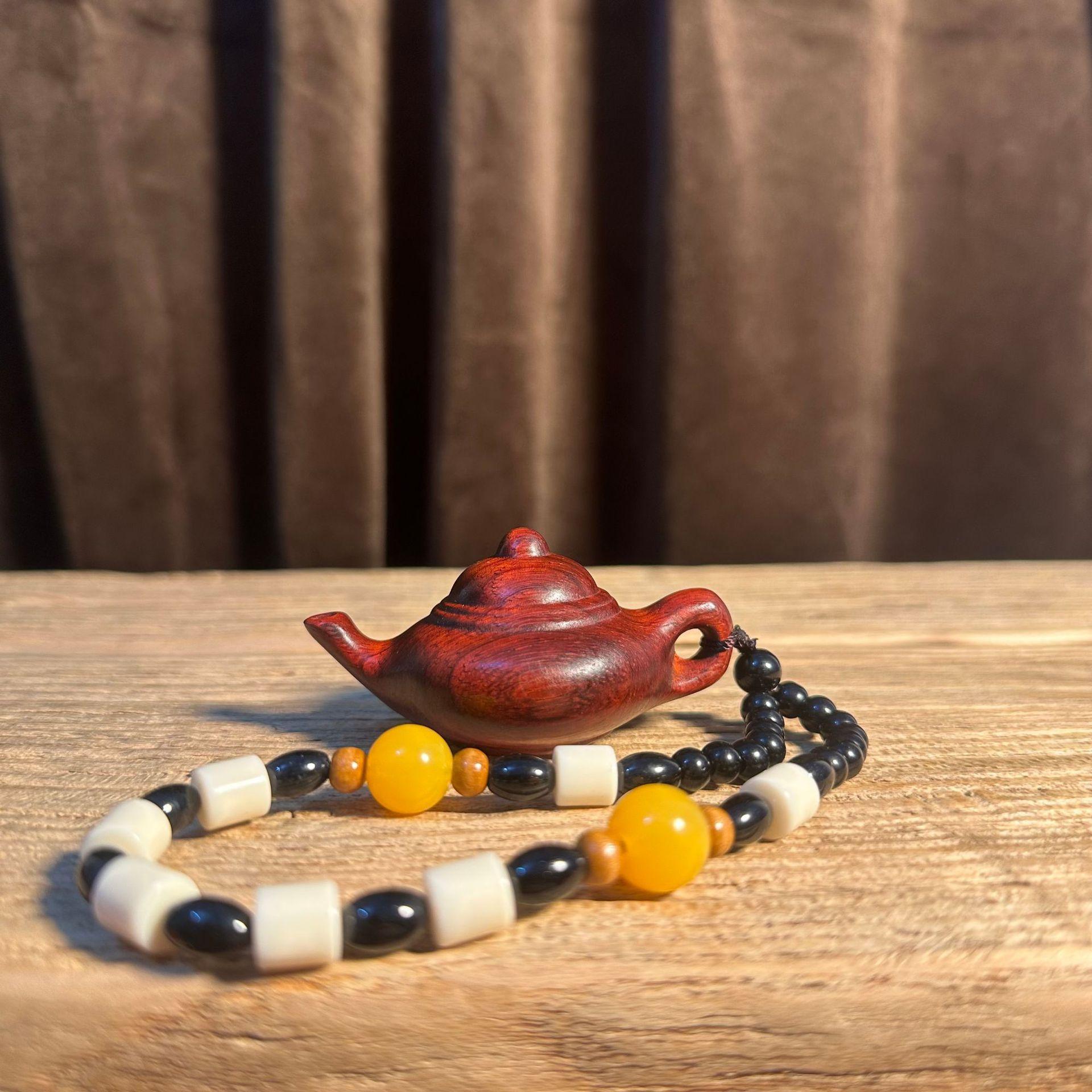 Ebony Carved Teapot Mahjong Handle Hu Hand Piece Wen Wan Handle Hu Portable Ornament
Ebony Carved Teapot Mahjong Handle Hu Hand Piece Wen Wan Handle Hu Portable Ornament