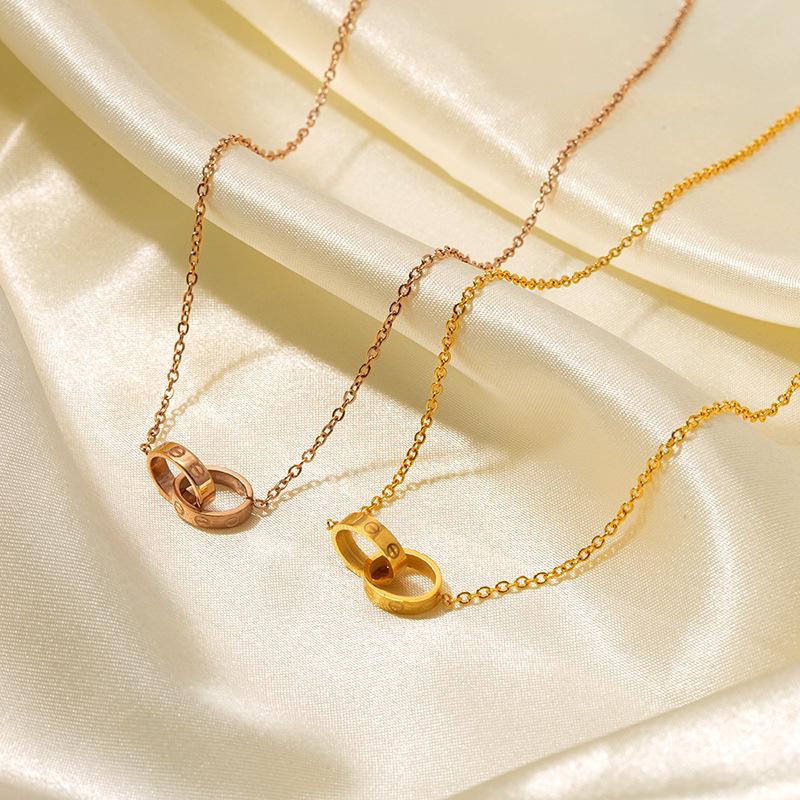 Rose Gold Double Ring Pendant Necklace – European & American Fashion, Titanium Steel Clavicle Chain
Rose Gold Double Ring Pendant Necklace – European & American Fashion, Titanium Steel Clavicle Chain