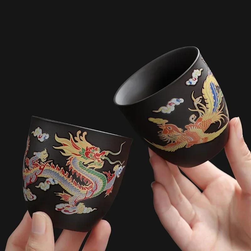 1pcs Dragon and Phoenix temperature change purple sand cup changes color in hot water household tea cup 110ml
1pcs Dragon and Phoenix temperature change purple sand cup changes color in hot water household tea cup 110ml