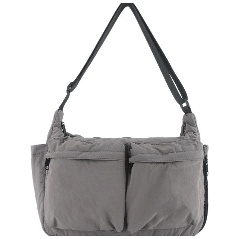 Men s Shoulder Bag New High-end Casual Shoulder Bag Anti Splash Backpack Large Capacity Lightweight Commuting Bag сірий колір
Men s Shoulder Bag New High-end Casual Shoulder Bag Anti Splash Backpack Large Capacity Lightweight Commuting Bag сірий колір