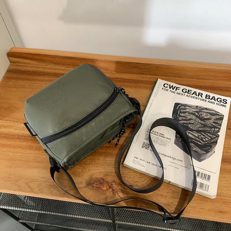 Summer high-end outdoor lightweight mobile phone bag female messenger small bag male sports canvas couple bag зелений
Summer high-end outdoor lightweight mobile phone bag female messenger small bag male sports canvas couple bag зелений