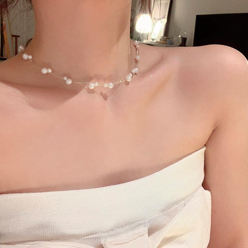Double-layer irregular pearl beaded necklace retro temperament collarbone chain niche high-end jewelry women
Double-layer irregular pearl beaded necklace retro temperament collarbone chain niche high-end jewelry women