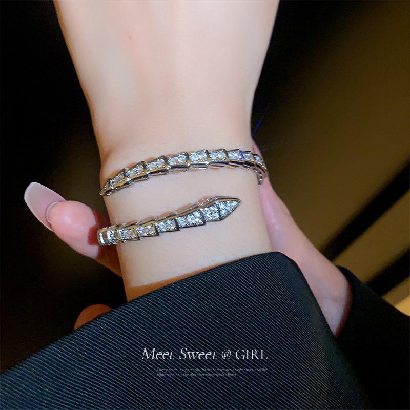 European & American Zircon Snake Bone Silver Bangle - Women s Fashion Niche Design Open Cuff
European & American Zircon Snake Bone Silver Bangle - Women s Fashion Niche Design Open Cuff