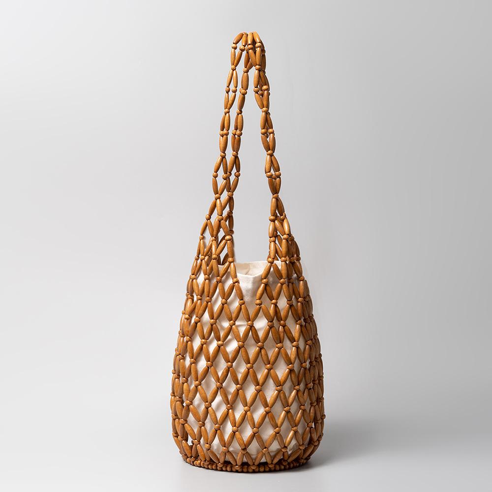 Women Woven Hand Bag Summer Hollow-out Design Wooden Bead Tote Shoulder Bucket Bag Female Reticulate Netted Canvas Beach Handbag коричневый
Women Woven Hand Bag Summer Hollow-out Design Wooden Bead Tote Shoulder Bucket Bag Female Reticulate Netted Canvas Beach Handbag коричневый