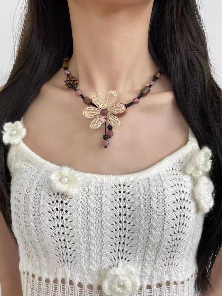 Bohemia White Hollowed-out Five-petal Flower Pendant Wooden Beads Black Rope Woven Necklace for Women Jewelry Two Ways To Wear
Bohemia White Hollowed-out Five-petal Flower Pendant Wooden Beads Black Rope Woven Necklace for Women Jewelry Two Ways To Wear