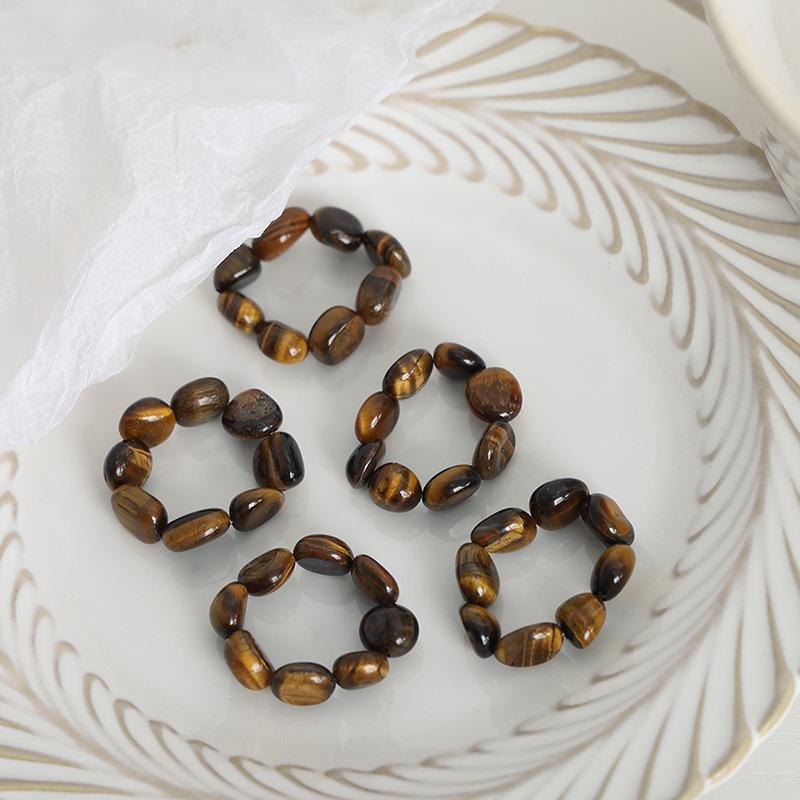 Tiger Eye Stone Adjustable Elastic Ring - Versatile, Stackable Jewelry with a Luxurious Touch. Size 8
Tiger Eye Stone Adjustable Elastic Ring - Versatile, Stackable Jewelry with a Luxurious Touch. Size 8