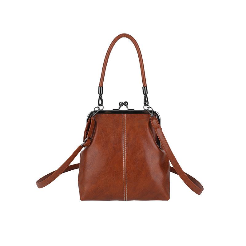 Retro national trend fresh style women s handbag versatile temperament commuter crossbody bag British style simple shoulder bag коричневий
Retro national trend fresh style women s handbag versatile temperament commuter crossbody bag British style simple shoulder bag коричневий
