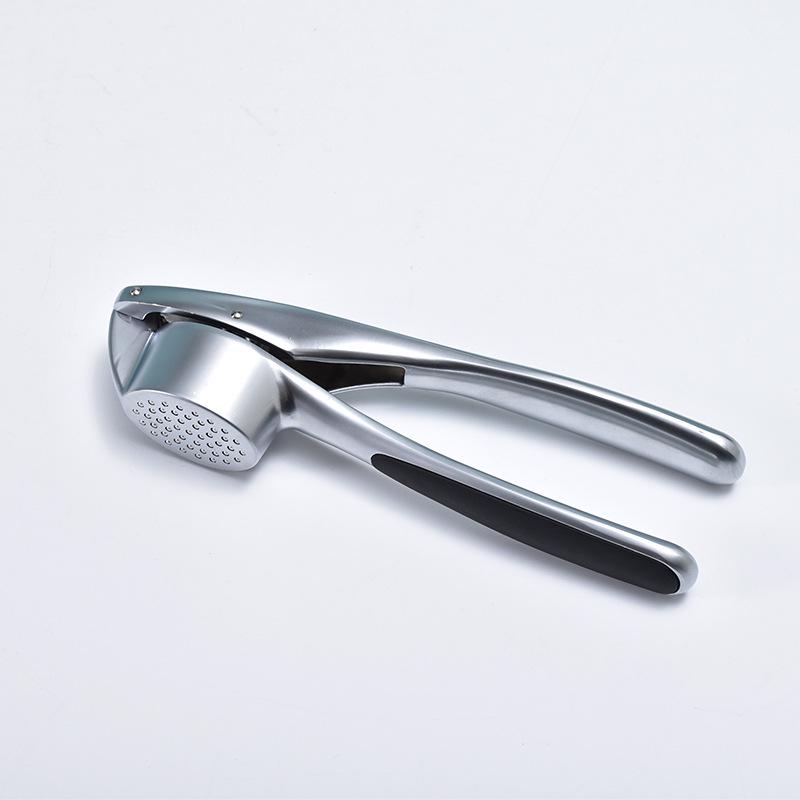Premium Zinc Alloy Garlic Press - Efficient Kitchen Tool for Easy Garlic Peeling and Pressing срібний
Premium Zinc Alloy Garlic Press - Efficient Kitchen Tool for Easy Garlic Peeling and Pressing срібний