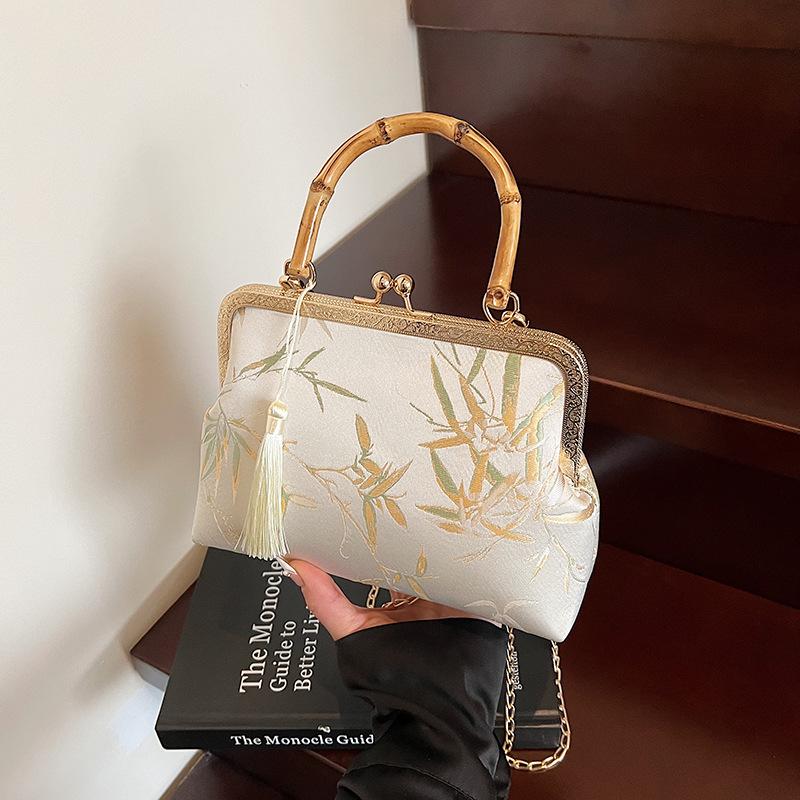 Вишукано вишита нова китайська сумка-чонсам - натхненний ханбоком візерунок лілій, багатофункціональна жіноча сумка через плече, елегантна традиційна естетика
Вишукано вишита нова китайська сумка-чонсам - натхненний ханбоком візерунок лілій, багатофункціональна жіноча сумка через плече, елегантна традиційна естетика