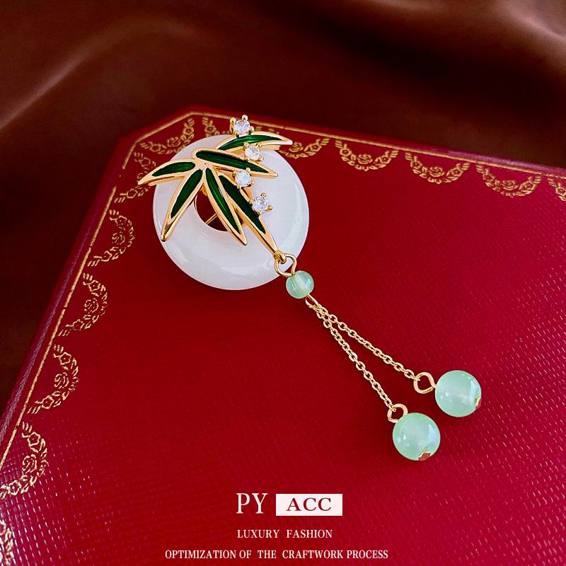Chinese Style Gold-Plated Zircon Bamboo Leaf Enamel Brooch – Artistic National Style Jewelry
Chinese Style Gold-Plated Zircon Bamboo Leaf Enamel Brooch – Artistic National Style Jewelry