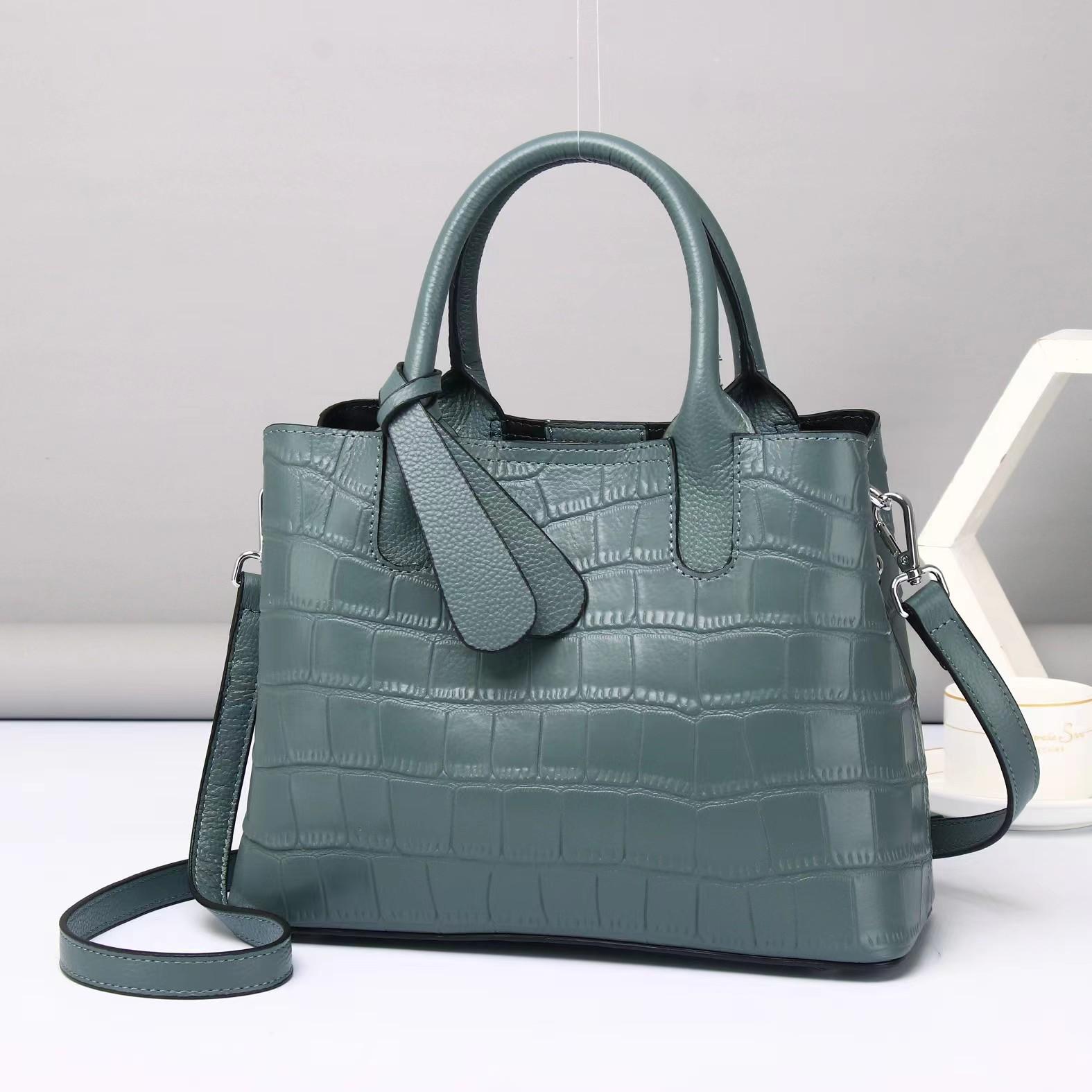 Новая кожаная женская сумка из первого слоя коровьей кожи с узором аллигатора, модная универсальная женская сумка-мессенджер 28*12*21cm озеро зеленый
Новая кожаная женская сумка из первого слоя коровьей кожи с узором аллигатора, модная универсальная женская сумка-мессенджер 28*12*21cm озеро зеленый