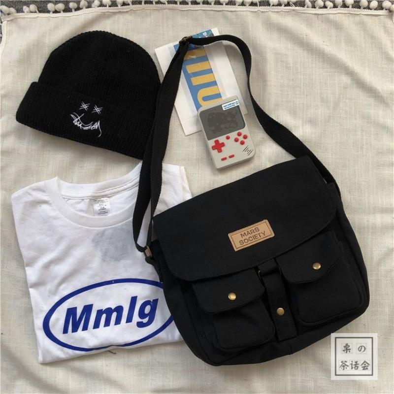Japanese Harajuku Tooling Crossbody Bag Female, Korean ins Vintage Student Canvas Bag Art Academy Wind Mail A single bag without pendant
Japanese Harajuku Tooling Crossbody Bag Female, Korean ins Vintage Student Canvas Bag Art Academy Wind Mail A single bag without pendant