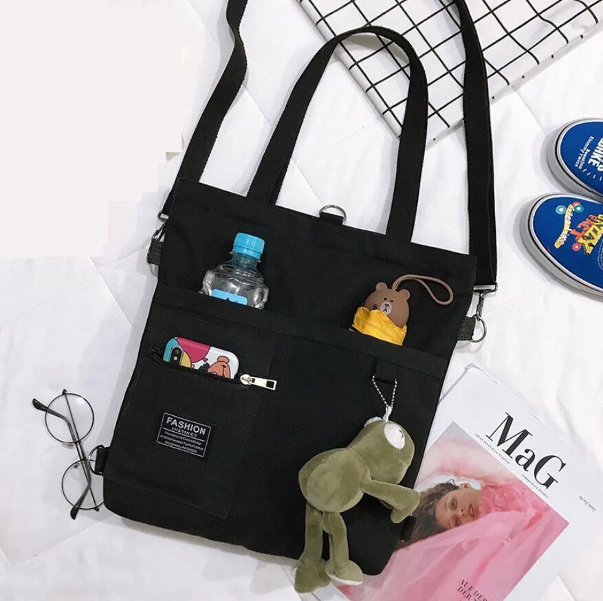 Canvas Women Handbag Shoulder Bags Large Capacity Simple Folding Handbags Tote Shopping Bag with Frog Pendant Book Bags for Girl
Canvas Women Handbag Shoulder Bags Large Capacity Simple Folding Handbags Tote Shopping Bag with Frog Pendant Book Bags for Girl