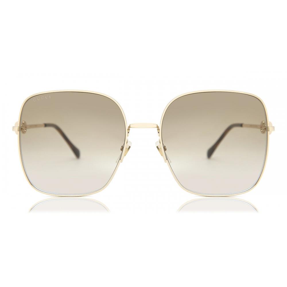 Gucci Gg0879s 002 Women Sunglasses Gold/61-18-140
Gucci Gg0879s 002 Women Sunglasses Gold/61-18-140