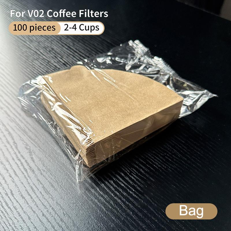 Disposable V Shaped Coffee Filter Paper 100 Sheets Natural Unbleached High Permeability Cone For Hand Drip Coffee Machine
Disposable V Shaped Coffee Filter Paper 100 Sheets Natural Unbleached High Permeability Cone For Hand Drip Coffee Machine