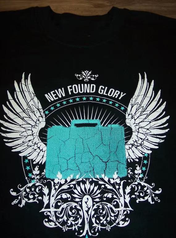 New Found Glory Suitcase Angel Wings T Shirt All Size S5XL Gift Fan KK451 Unisex T-Shirt S
New Found Glory Suitcase Angel Wings T Shirt All Size S5XL Gift Fan KK451 Unisex T-Shirt S