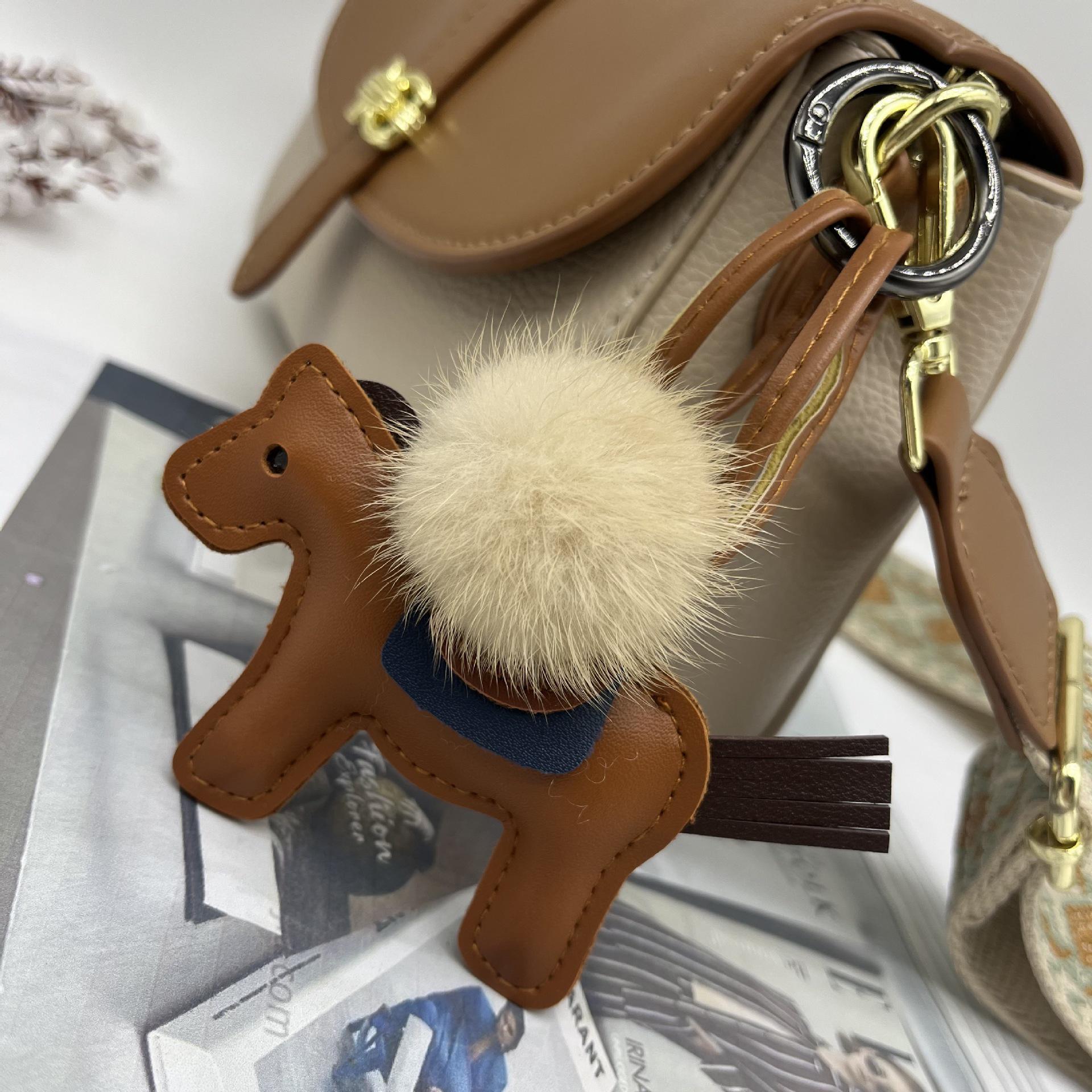Mink Fur Pompon Little Horse PU Leather Bag Charm
Mink Fur Pompon Little Horse PU Leather Bag Charm