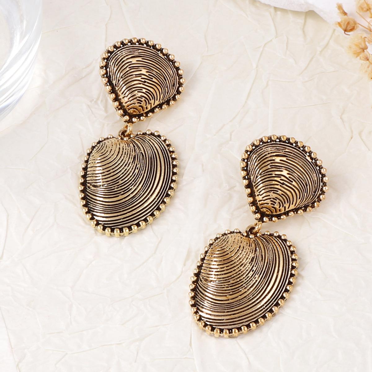 Модные серьги-подвески для женщин золотой
Модные серьги-подвески для женщин золотой