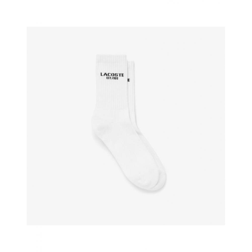 Lacoste Универсальные спортивные носки с надписью Ra132e 55g 001 0T4 
Lacoste Универсальные спортивные носки с надписью Ra132e 55g 001 0T4