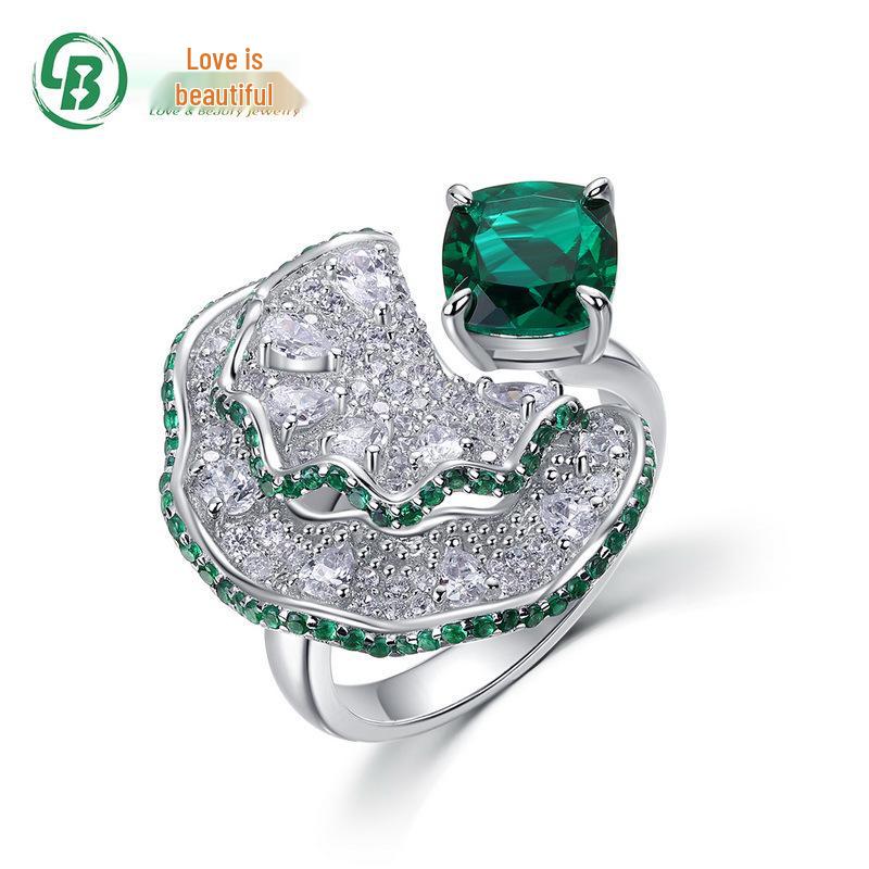 Elegant European & American Sterling Silver Ring with Cultivated Emerald & Diamond Petal Design Adjustable Opening
Elegant European & American Sterling Silver Ring with Cultivated Emerald & Diamond Petal Design Adjustable Opening