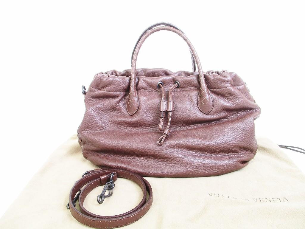 Автентична шкіряна темно-коричнева ручна сумка BOTTEGA VENETA Intrecciato з портмоне на ремінці №6281 відремонтована
Автентична шкіряна темно-коричнева ручна сумка BOTTEGA VENETA Intrecciato з портмоне на ремінці №6281 відремонтована