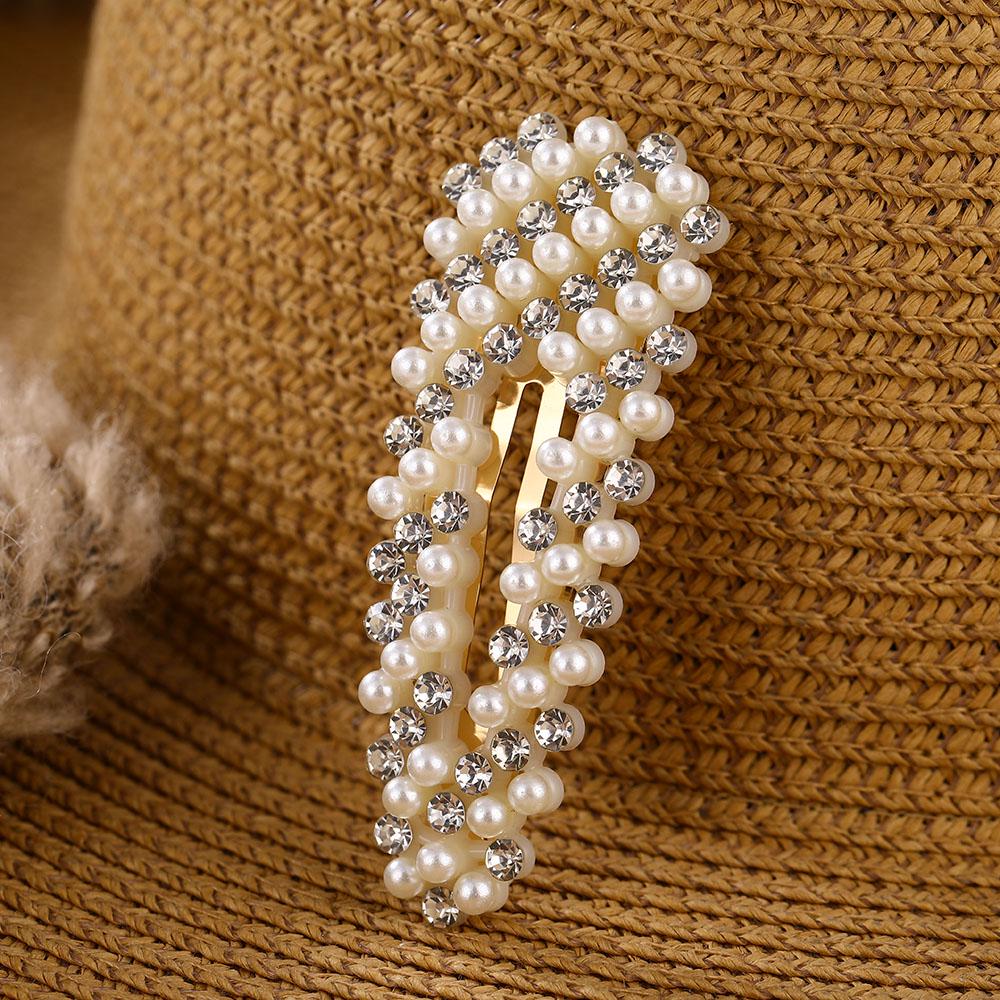 Набор из 12 заколок для волос с жемчужными бусинами 3
Набор из 12 заколок для волос с жемчужными бусинами 3