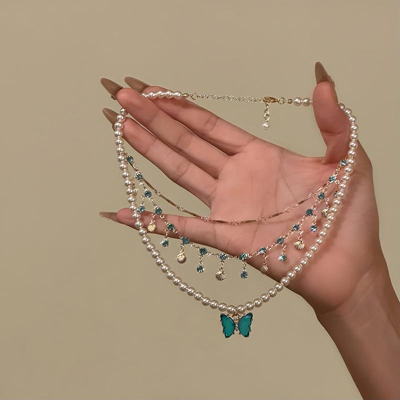 French zircon three-layer butterfly pendant stacked necklace retro fashion personalized collarbone chain light luxury high-end item decoration
French zircon three-layer butterfly pendant stacked necklace retro fashion personalized collarbone chain light luxury high-end item decoration