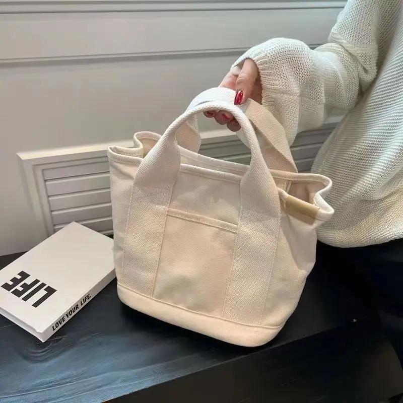 Cloth Bag Canvas Simple Bag Canvas Bag Style Lunch Box Hand-held Multi-layer Bento Bag Casual брудно-білий
Cloth Bag Canvas Simple Bag Canvas Bag Style Lunch Box Hand-held Multi-layer Bento Bag Casual брудно-білий