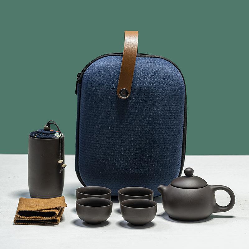Purple sand tea set Xishi pot travel set Outdoor tea making portable one pot of four cups activity supplies
Purple sand tea set Xishi pot travel set Outdoor tea making portable one pot of four cups activity supplies