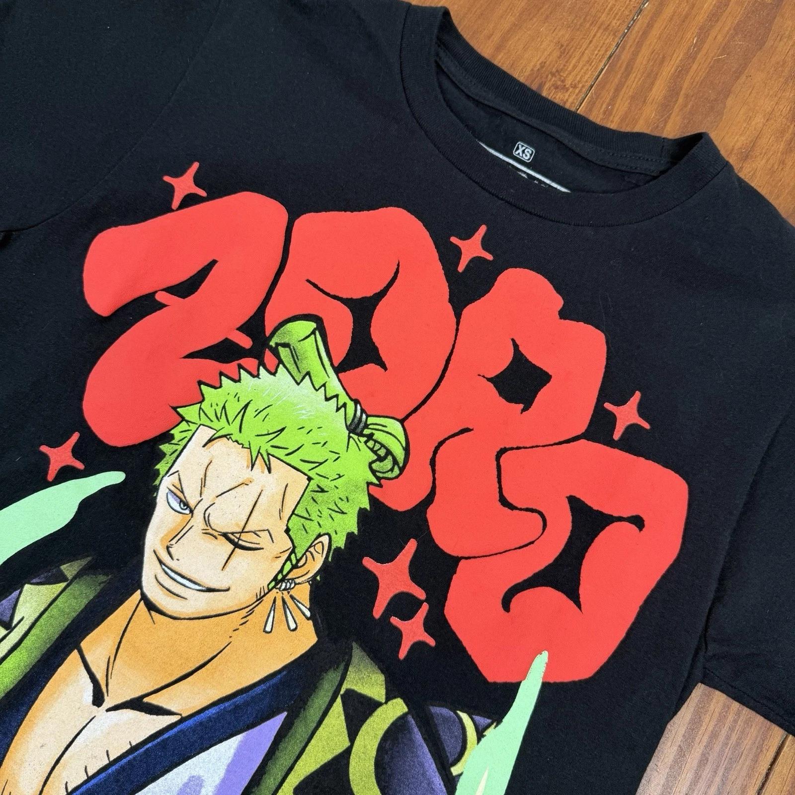 One Piece Zoro T-Shirt - Ripple Junction x Hot Topic Mens XS- Black Graphic Tee 2XL
One Piece Zoro T-Shirt - Ripple Junction x Hot Topic Mens XS- Black Graphic Tee 2XL