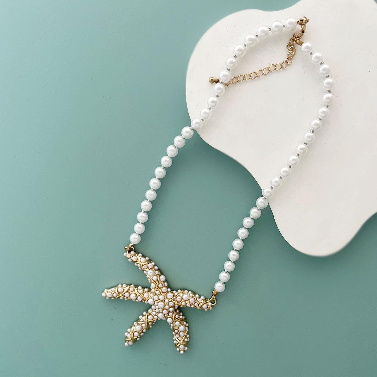 Personalized creative design sense alloy special-shaped starfish pendant imitation pearl beaded necklace ins resort style
Personalized creative design sense alloy special-shaped starfish pendant imitation pearl beaded necklace ins resort style