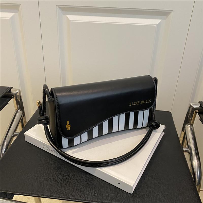 Контрастный цвет, принт в виде клавиш пианино, нишевый дизайн, новая модная сумка-мессенджер через плечо/подмышку, женская сумка чёрный
Контрастный цвет, принт в виде клавиш пианино, нишевый дизайн, новая модная сумка-мессенджер через плечо/подмышку, женская сумка чёрный