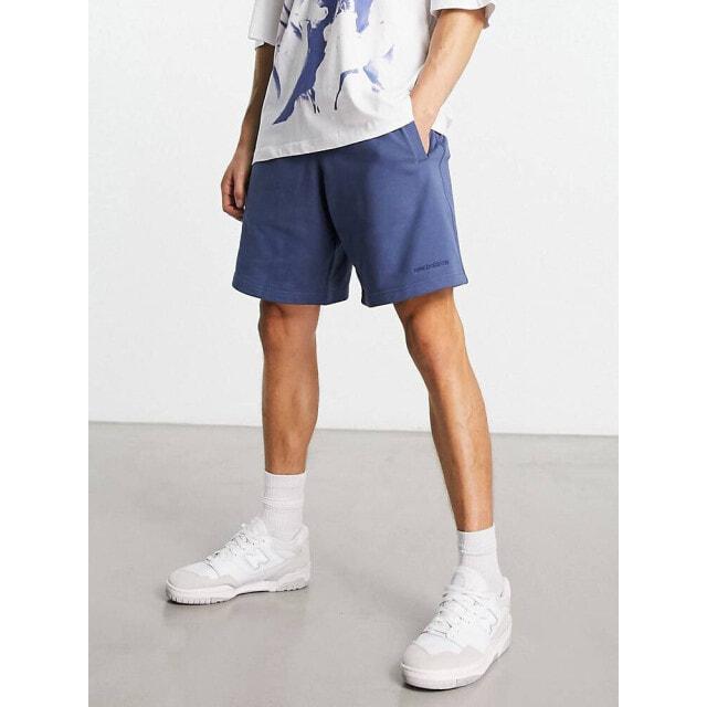 Выбеленные синие шорты New Balance с логотипом 
Выбеленные синие шорты New Balance с логотипом