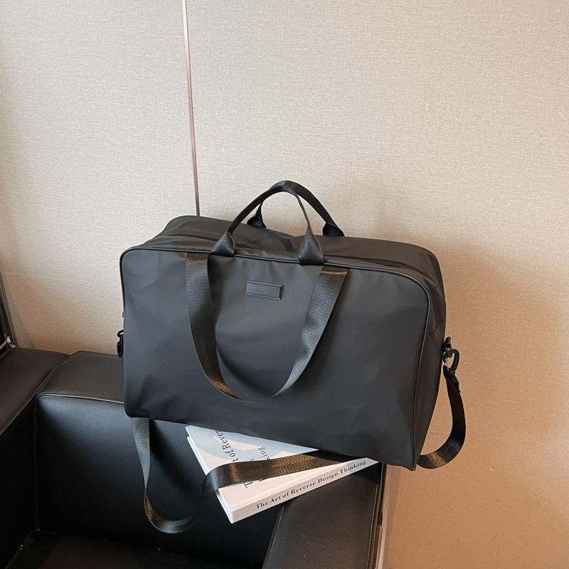 Tooling wind large-capacity travel bag new fashion portable messenger bag simple and light short-distance luggage bag чёрный
Tooling wind large-capacity travel bag new fashion portable messenger bag simple and light short-distance luggage bag чёрный