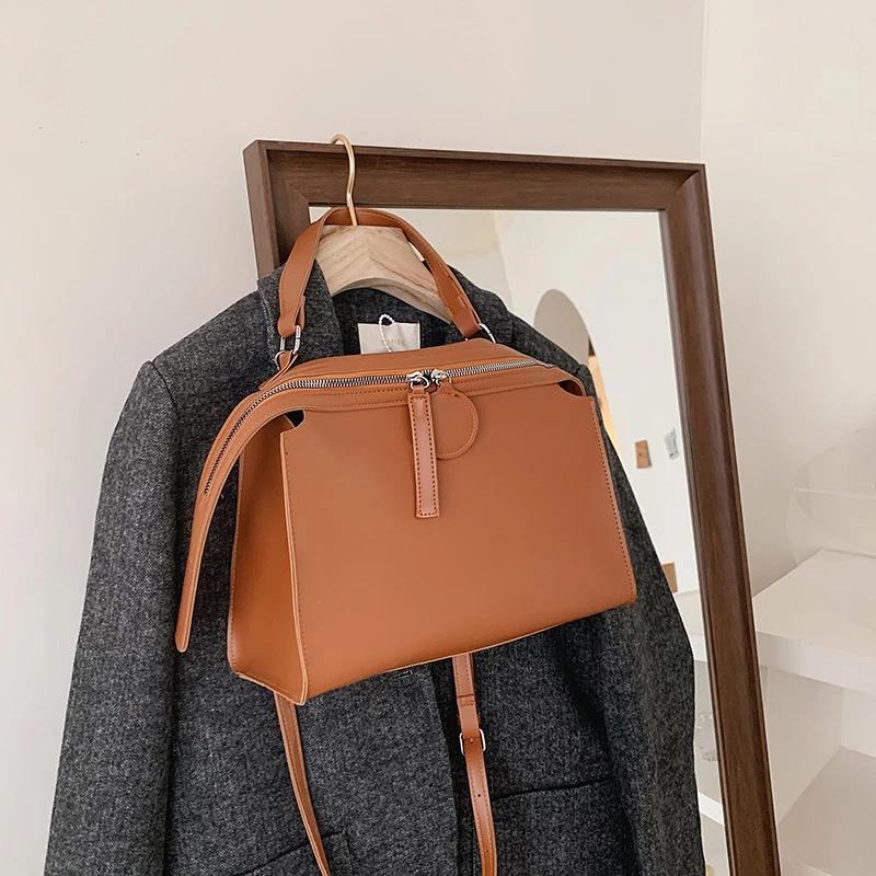 Однотонные женские сумки с молнией внутри, сумки с верхней ручкой, мягкое внутреннее отделение, модные сумки
Однотонные женские сумки с молнией внутри, сумки с верхней ручкой, мягкое внутреннее отделение, модные сумки