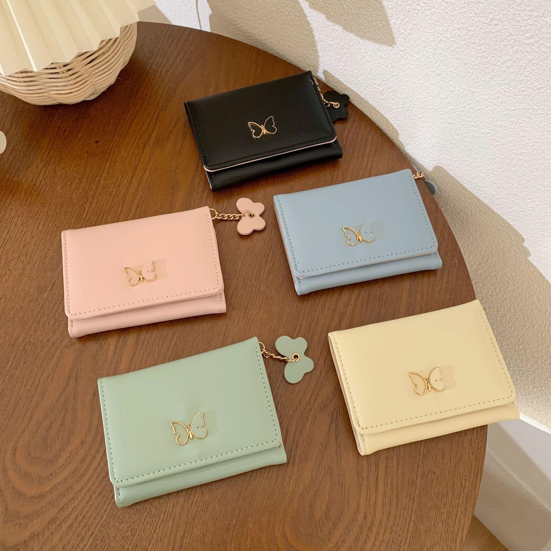 Wallet female short ins simple student multi-card position large-capacity card bag change bag чорний
Wallet female short ins simple student multi-card position large-capacity card bag change bag чорний