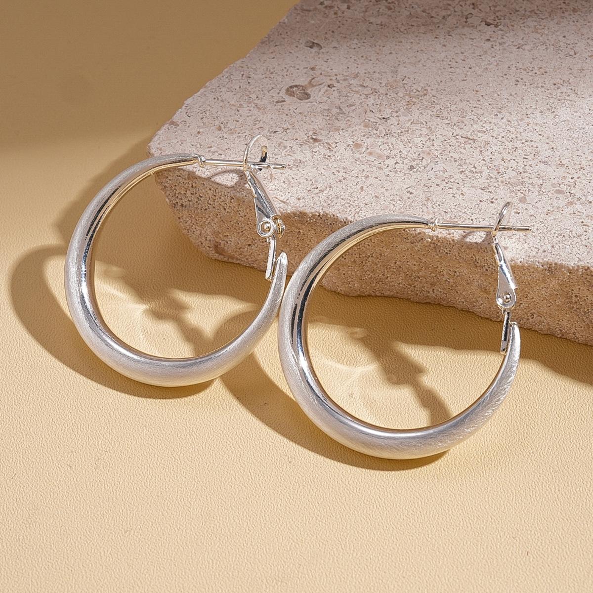 18k real gold electroplated brushed round silver needle earrings simple earrings
18k real gold electroplated brushed round silver needle earrings simple earrings