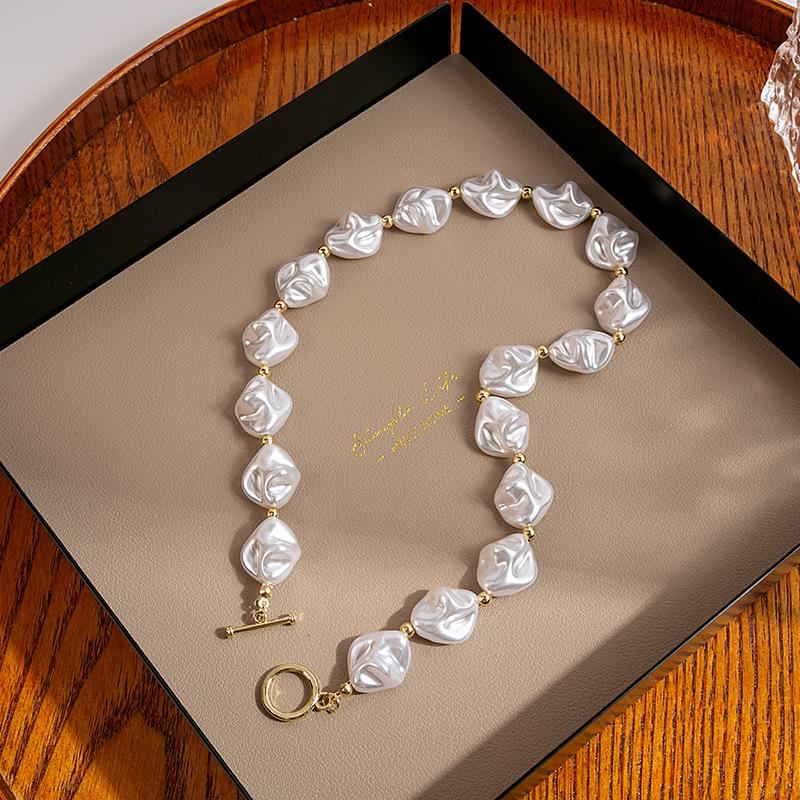 Жіноче намисто та браслет з перлами в стилі французького бароко з замком OT і кубинським ланцюжком
Жіноче намисто та браслет з перлами в стилі французького бароко з замком OT і кубинським ланцюжком