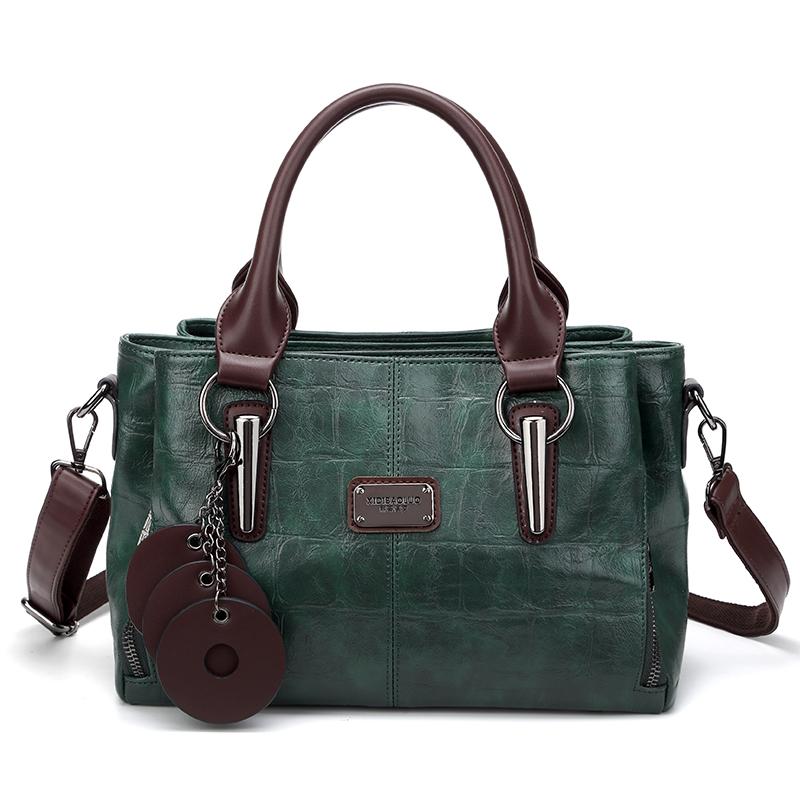 Жіноча шкіряна сумка-саквояж великої місткості з верхньою ручкою та плечовим ремінцем, гаманець через плече зелений
Жіноча шкіряна сумка-саквояж великої місткості з верхньою ручкою та плечовим ремінцем, гаманець через плече зелений